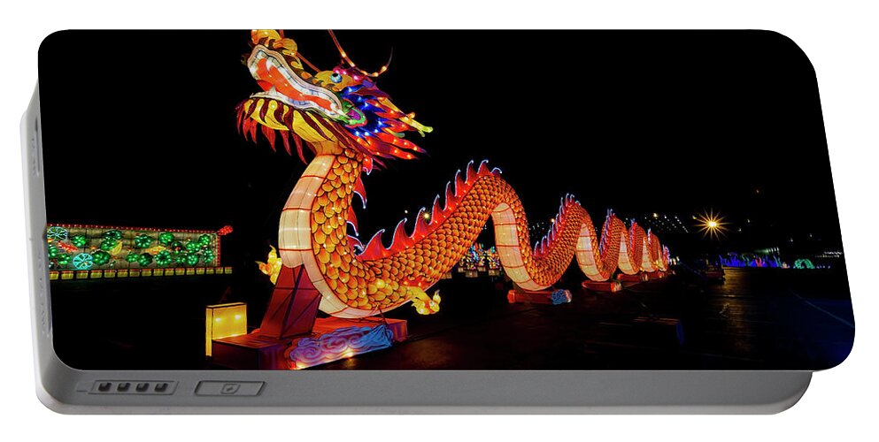 Dragon Portable Battery Charger featuring the photograph Dragon light fest by Sven Brogren