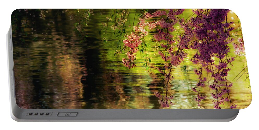 Cherry Blossoms Portable Battery Charger featuring the photograph Echoes of Monet - Cherry Blossoms Over a Pond - Brooklyn Botanic Garden by Vivienne Gucwa