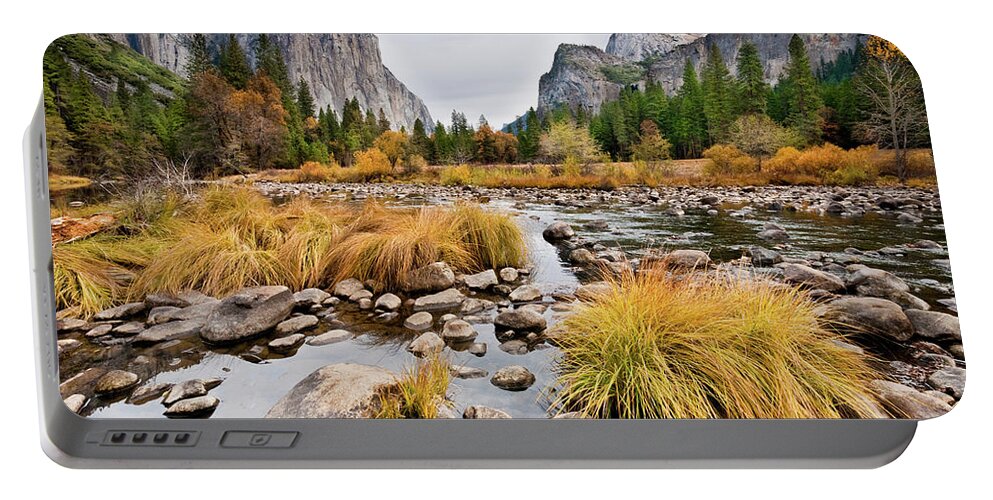Autumn Portable Battery Charger featuring the photograph El Capitan and the Merced River in the Fall by Jeff Goulden