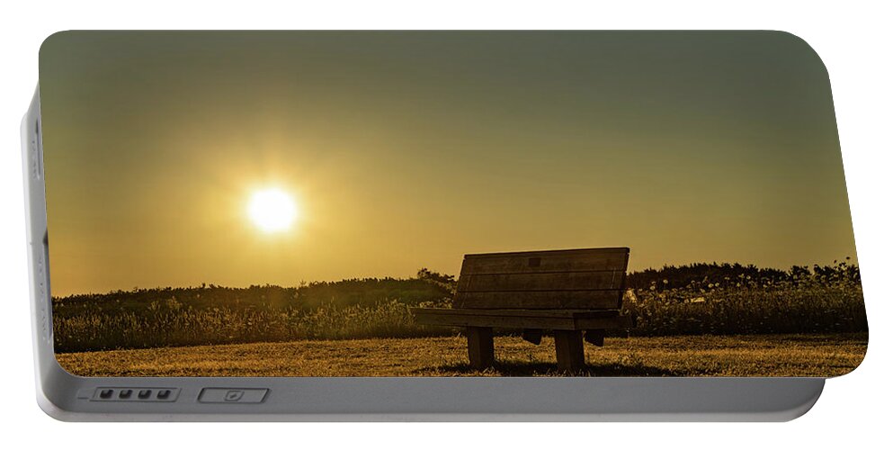 Explorecanada Portable Battery Charger featuring the photograph Empty Cavendish Beach Bench by Chris Bordeleau