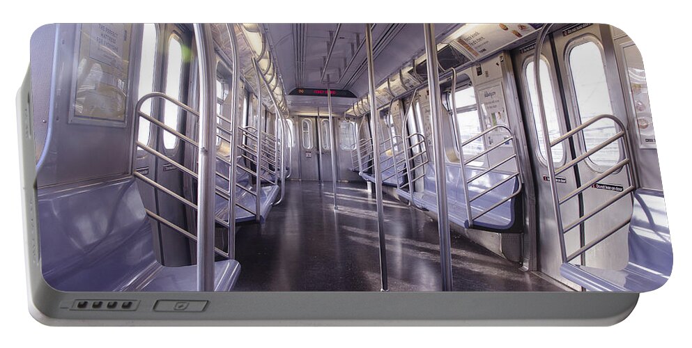 New York Portable Battery Charger featuring the photograph Empty train to Coney Island by Erik Burg