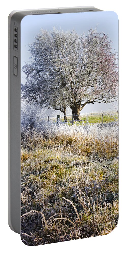 Amazing Portable Battery Charger featuring the photograph Enchanting snow covered landscape by Jorgo Photography