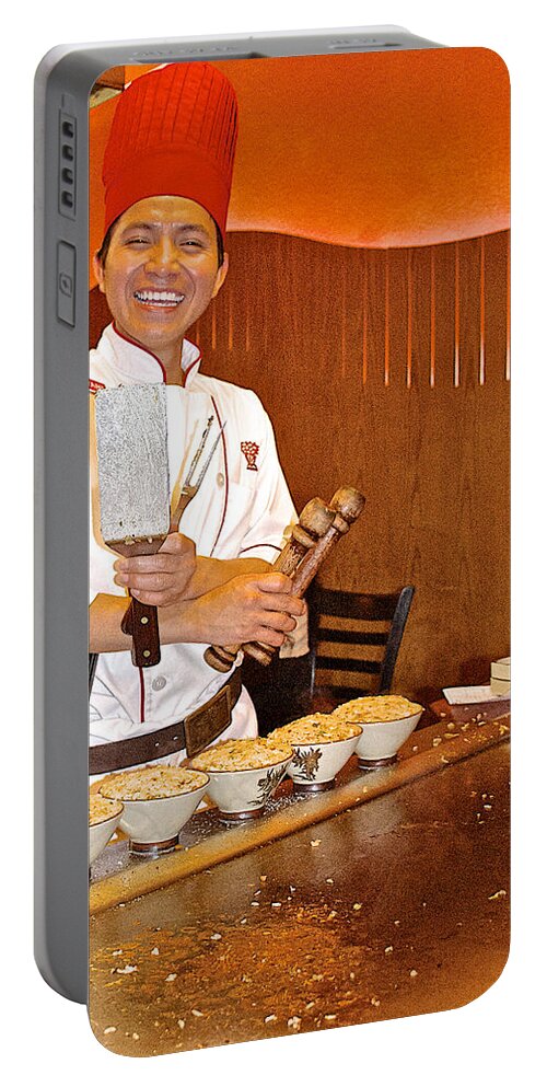 Entertaining Chef At Benihana In Monterey Portable Battery Charger featuring the photograph Entertaining Chef at Benihana in Monterey-California by Ruth Hager