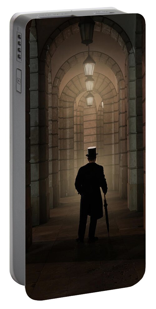 Victorian Man Portable Battery Charger featuring the photograph Evening walk in the archway by Jaroslaw Blaminsky
