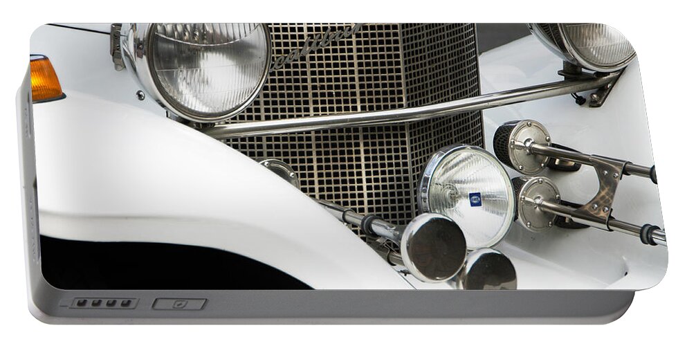 Car Portable Battery Charger featuring the photograph Excalibur by Adriana Zoon