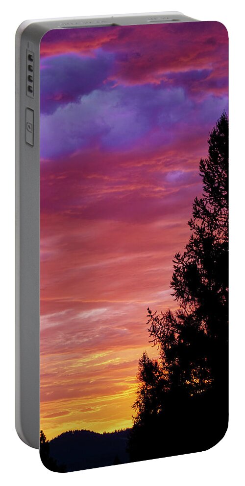 Sunrise Portable Battery Charger featuring the photograph Exploding Color by Loni Collins