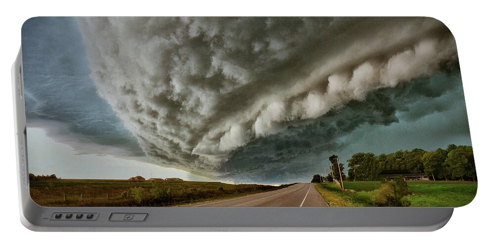 Storm Portable Battery Charger featuring the photograph Face In The Storm by Andrea Platt