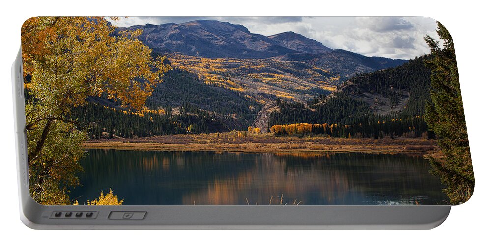 Autumn Colors Portable Battery Charger featuring the photograph Fall's Fading Reflection by Jim Garrison