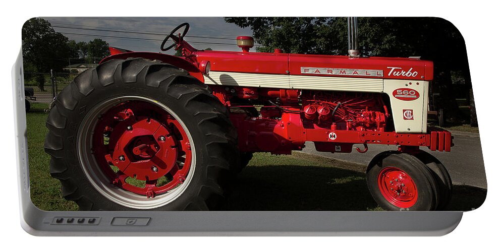 Tractor Portable Battery Charger featuring the photograph Farmall Turbo 560 by Mike Eingle