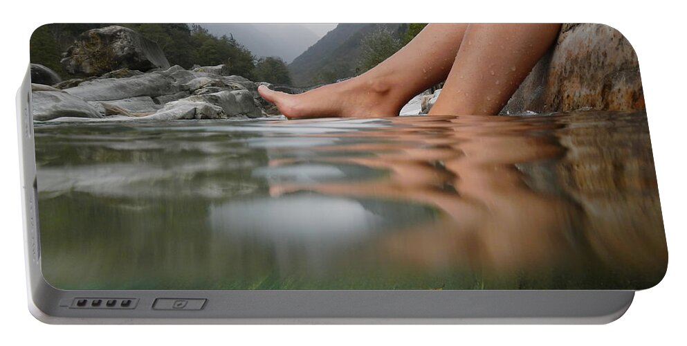 Feet Portable Battery Charger featuring the photograph Feet on the water by Mats Silvan