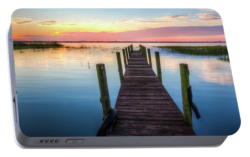 Boats Portable Battery Charger featuring the photograph Fishing Dock at Sunrise by Debra and Dave Vanderlaan
