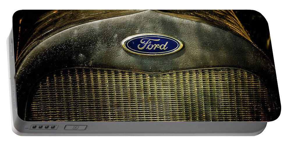 Flemings Portable Battery Charger featuring the photograph Old Ford Automobile Grill by Louis Dallara