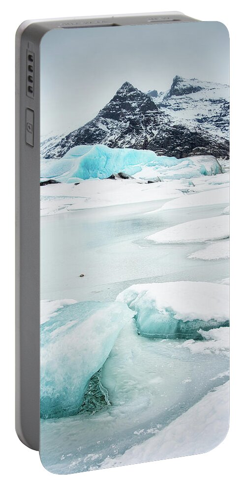 Fjallsarlon Portable Battery Charger featuring the photograph Fjallsarlon Glacier Lagoon Iceland in winter by Matthias Hauser