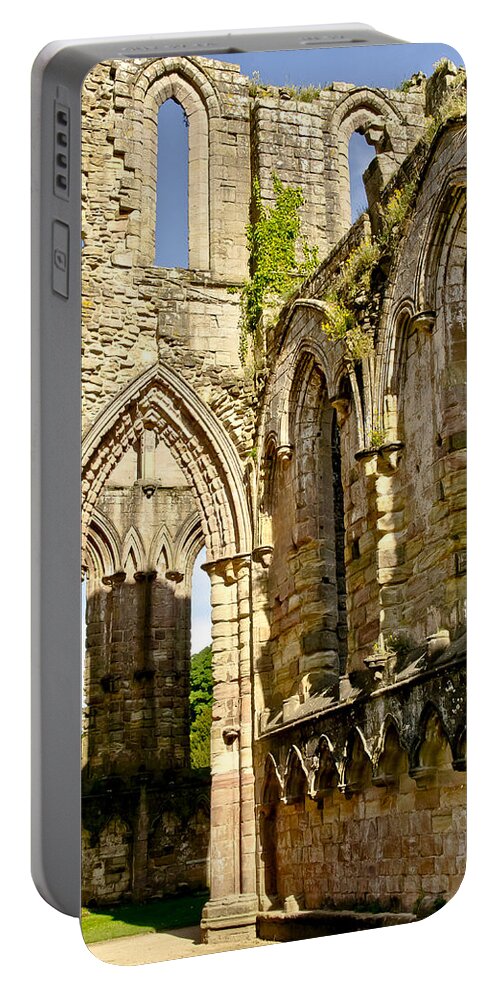 Walls Portable Battery Charger featuring the photograph Flowers, arched windows and sky. by Elena Perelman