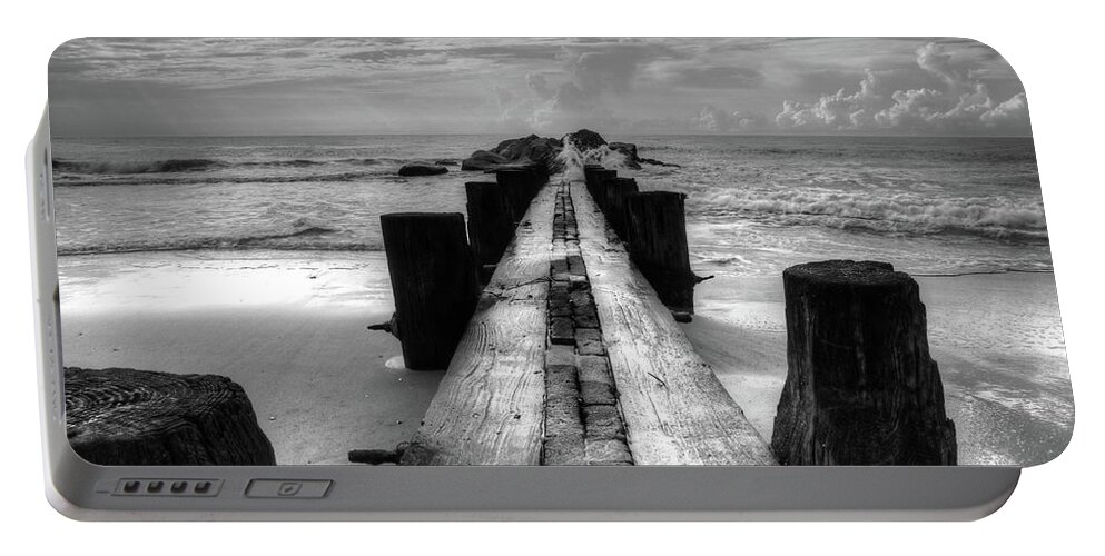 Folly Beach Pilings Portable Battery Charger featuring the photograph Folly Beach Pilings Charleston South Carolina In Black and White by Carol Montoya