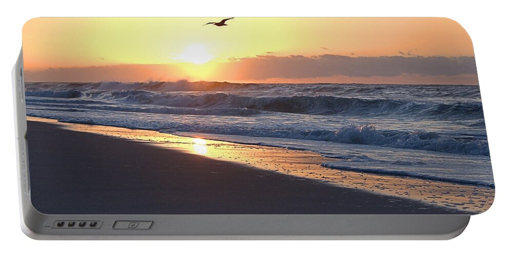 Sunrise Portable Battery Charger featuring the photograph Freedom by Newwwman