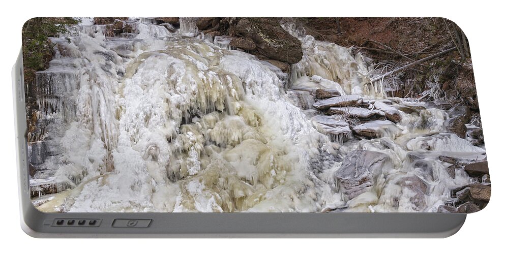 Waterfalls Portable Battery Charger featuring the photograph Frozen Flow At Bastion Falls by Angelo Marcialis