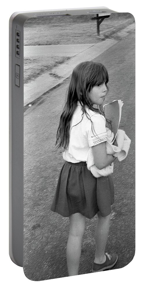 School Portable Battery Charger featuring the photograph Girl Returns Home from School, 1971 by Jeremy Butler