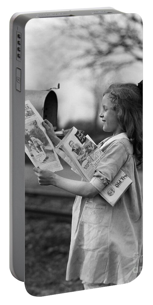 1940s Portable Battery Charger featuring the photograph Girl Taking Magazines From Mailbox by H. Armstrong Roberts/ClassicStock