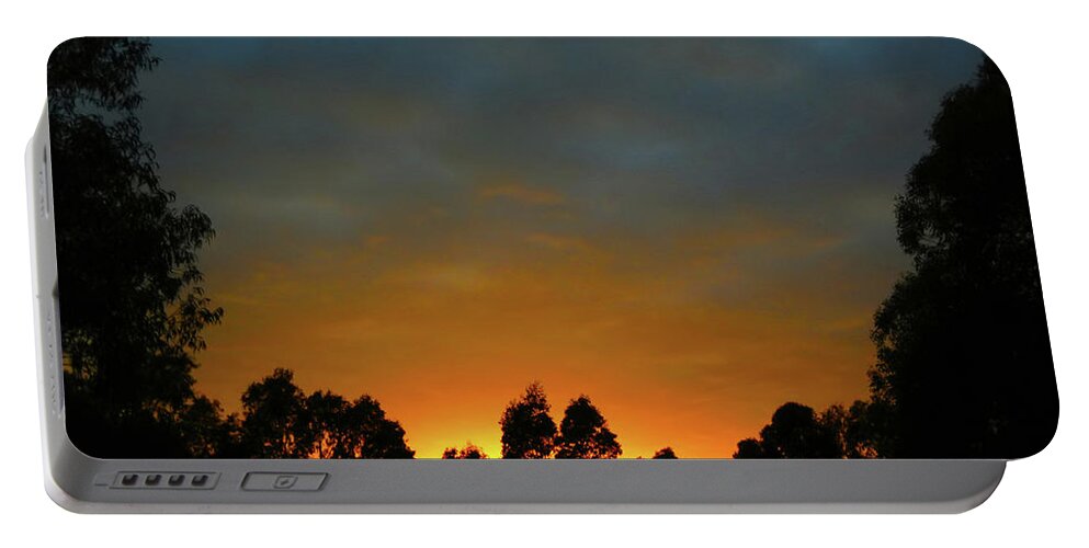 Sunrise Portable Battery Charger featuring the photograph Glade Sunrise by Mark Blauhoefer