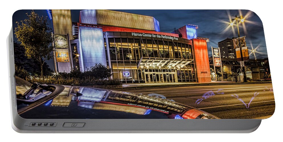 Marcus Center For Performing Arts Portable Battery Charger featuring the photograph Glamorous looking performing arts center in Milwaukee with reflection at dusk by Sven Brogren