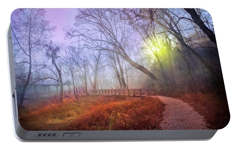 Appalachia Portable Battery Charger featuring the photograph Glowing Through the Trees by Debra and Dave Vanderlaan