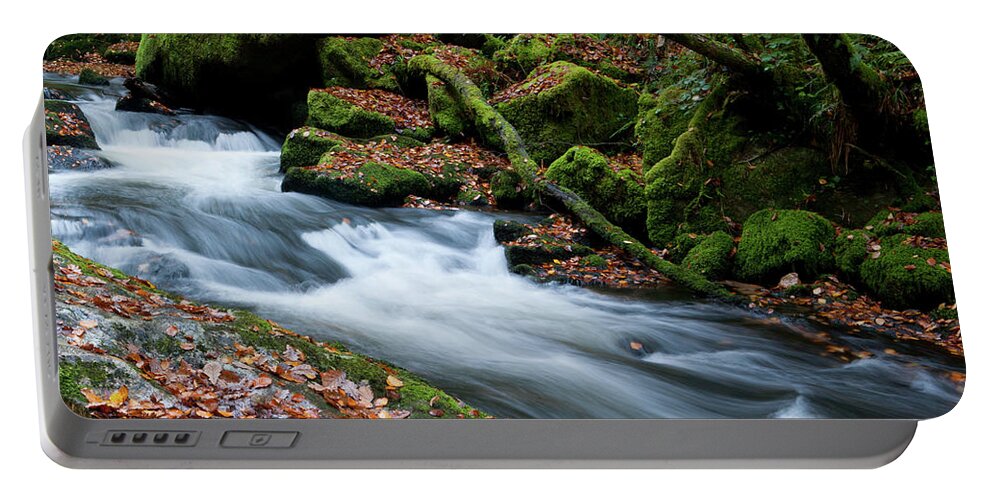 Blurry Water Portable Battery Charger featuring the photograph Golitha Falls iv by Helen Jackson