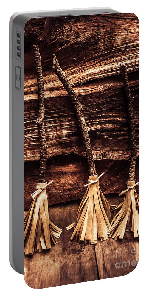 Witch Portable Battery Charger featuring the photograph Halloween witch brooms by Jorgo Photography
