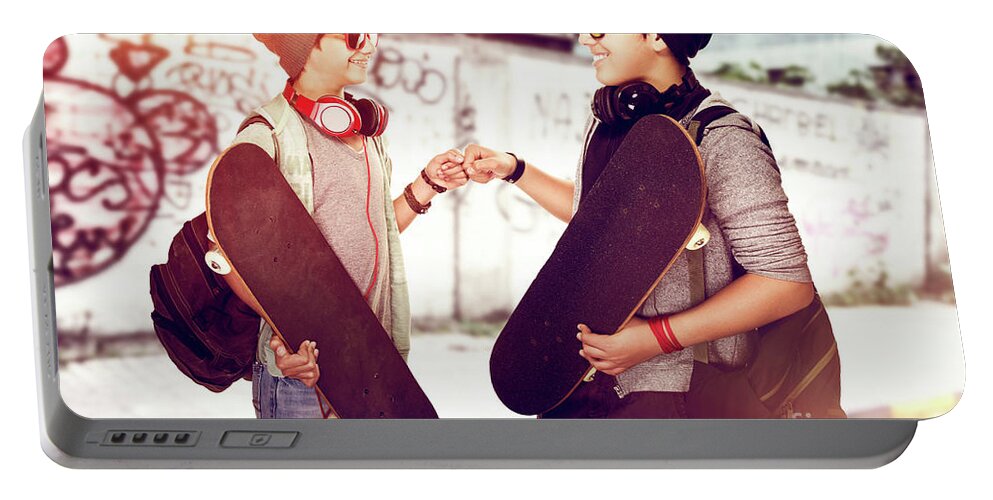 Acclaim Portable Battery Charger featuring the photograph Happy young skateboarders by Anna Om