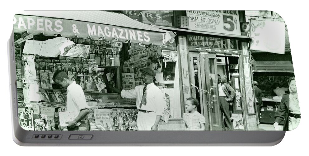 Street Scene Portable Battery Charger featuring the photograph Harlem newspaper stand, 1939 by Vincent Monozlay