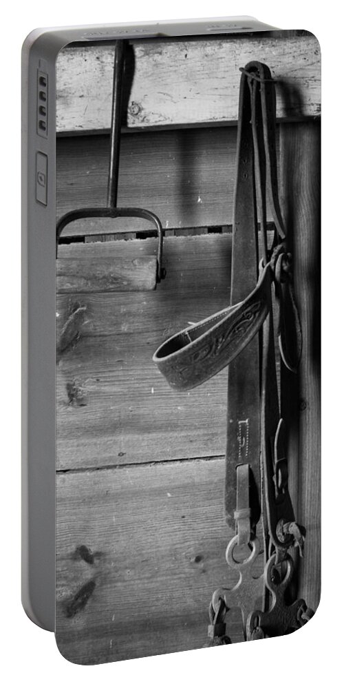 Black And White Portable Battery Charger featuring the photograph Hay Hook and Harness by Jeff Phillippi