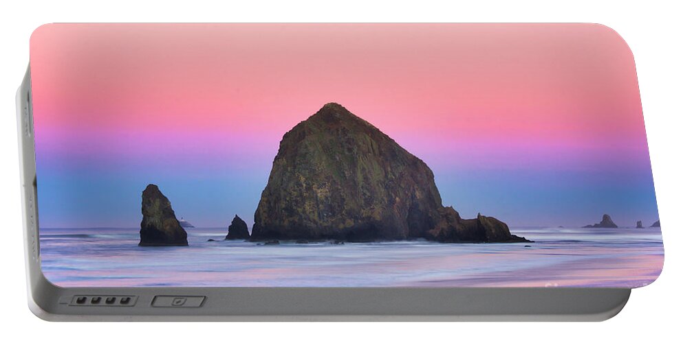 Haystack Rock Portable Battery Charger featuring the photograph Haystack Rock at dawn by Bruce Block