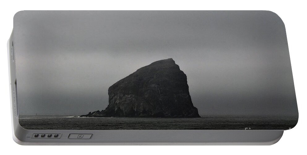 Oregon Portable Battery Charger featuring the photograph Haystack Rock by Stevyn Llewellyn