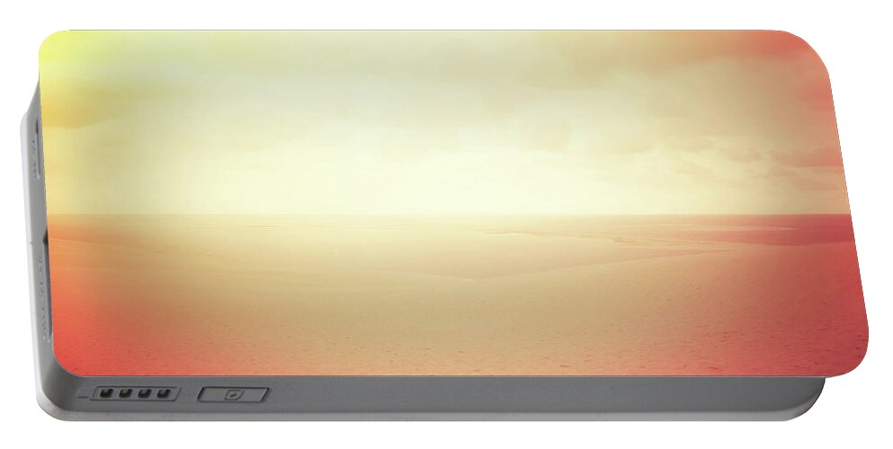 Dune Portable Battery Charger featuring the photograph Hazy sand dunes in red glow by GoodMood Art