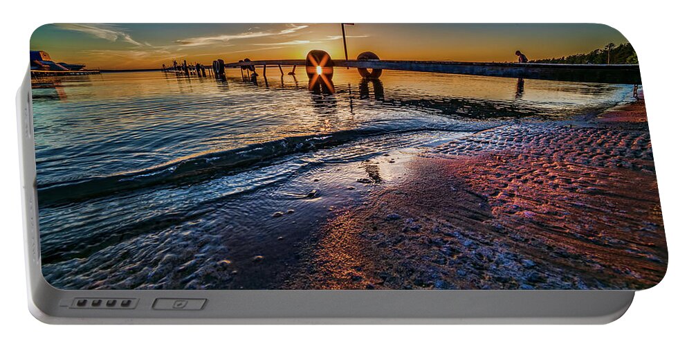 Sunflare Portable Battery Charger featuring the photograph Higgins Lake Maplehurst Dock Sunflare by Joe Holley