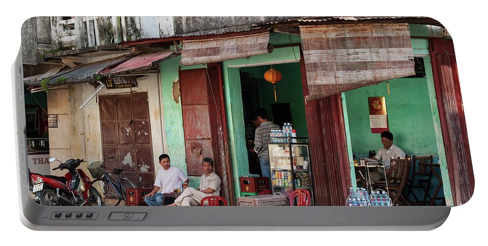 Vietnam Portable Battery Charger featuring the photograph Hoi An Corner Cafe 01 by Rick Piper Photography