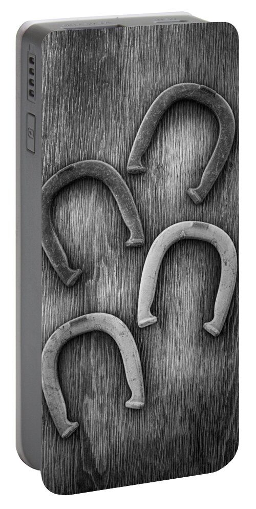 Antique Portable Battery Charger featuring the photograph Horseshoes Set by YoPedro