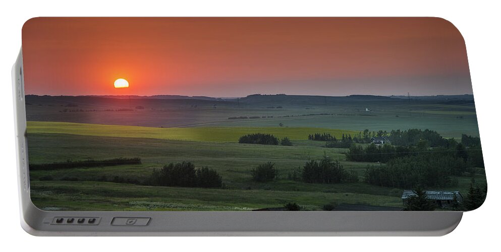 Sunset Portable Battery Charger featuring the photograph Hot Foothills Sunset by Bill Cubitt
