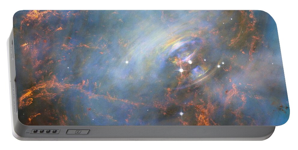 Crab Nebula Portable Battery Charger featuring the photograph Hubble Captures the Beating Heart of the Crab Nebula by Eric Glaser