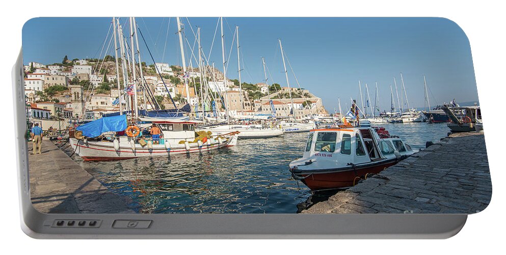 Aegis Portable Battery Charger featuring the photograph Hydra habour by Hannes Cmarits