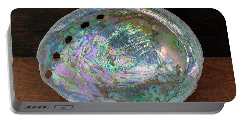 Abalone Shell Portable Battery Charger featuring the photograph Iridescent Abalone Shell on Antique Ponderosa Pine Wood by Kathy Anselmo