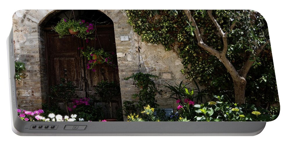 Flower Portable Battery Charger featuring the photograph Italian Front Door Adorned with Flowers by Marilyn Hunt