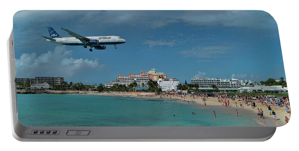 Jetblue Portable Battery Charger featuring the photograph jetBlue landing at SXM airport. by David Gleeson