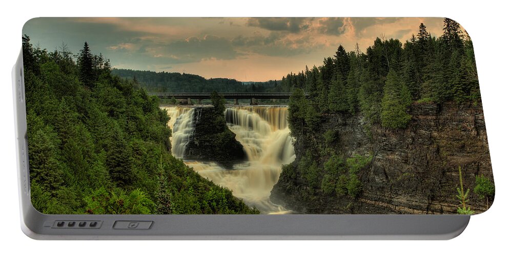 Green Mantle Portable Battery Charger featuring the photograph Kakabeka Falls After a Storm by Jakub Sisak