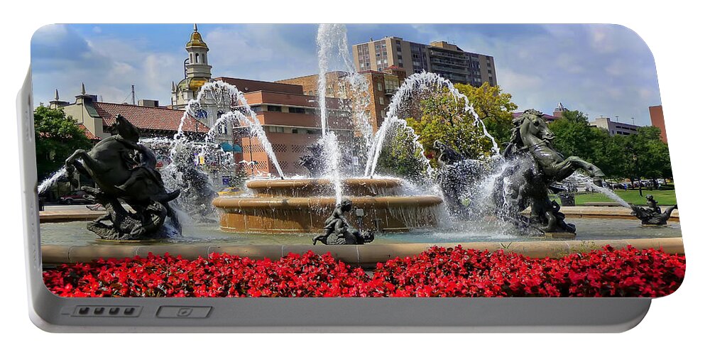 Kansas City Portable Battery Charger featuring the photograph Kansas City Fountain Ablaze in Crimson by Mitchell R Grosky