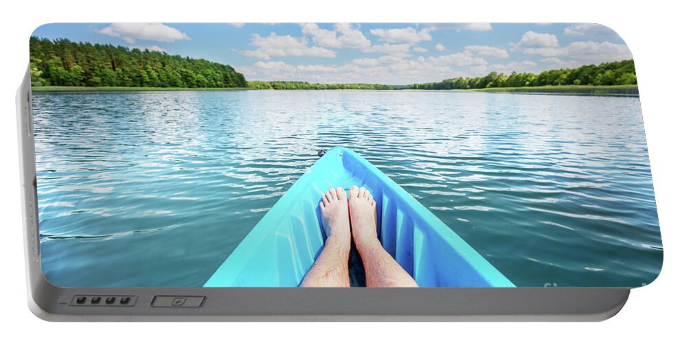 Kayaking Portable Battery Charger featuring the photograph Kayaking on the lake. by Michal Bednarek