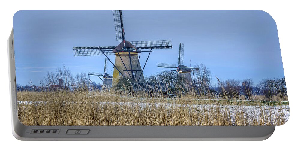 Windmill Portable Battery Charger featuring the photograph Kinderdijk Windmills in Winter by Frans Blok