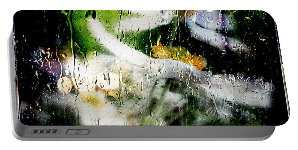 Anemone Portable Battery Charger featuring the photograph Kissed by rain.. by Jolanta Anna Karolska
