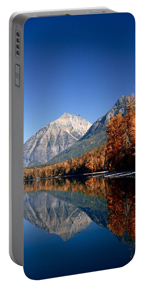 Lawrence Portable Battery Charger featuring the photograph Lake McDonald Autumn by Lawrence Boothby