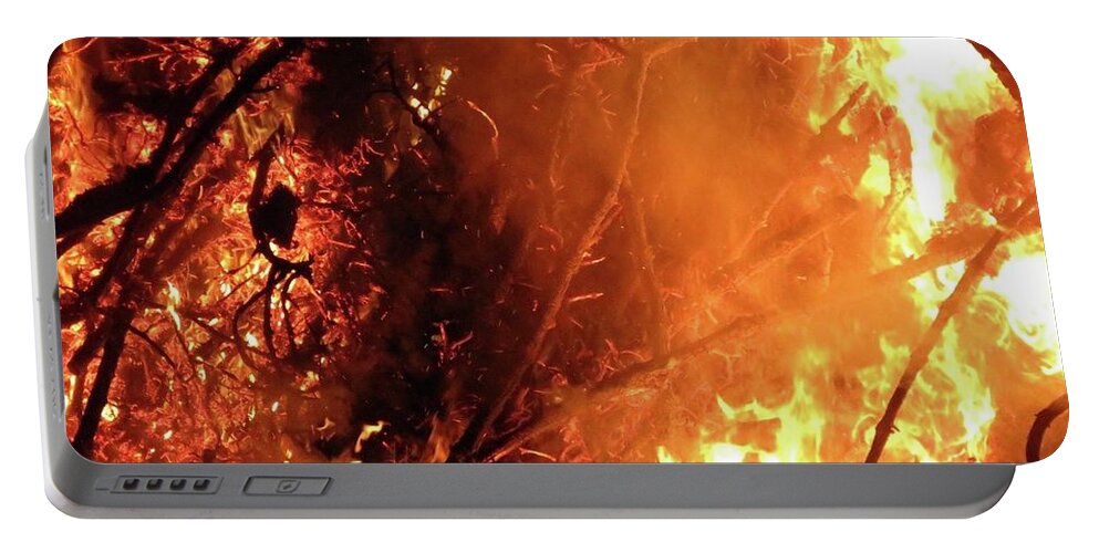 Fire Portable Battery Charger featuring the photograph Layers below by Azthet Photography